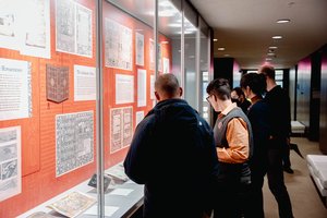 people looking at SCRC exhibition display